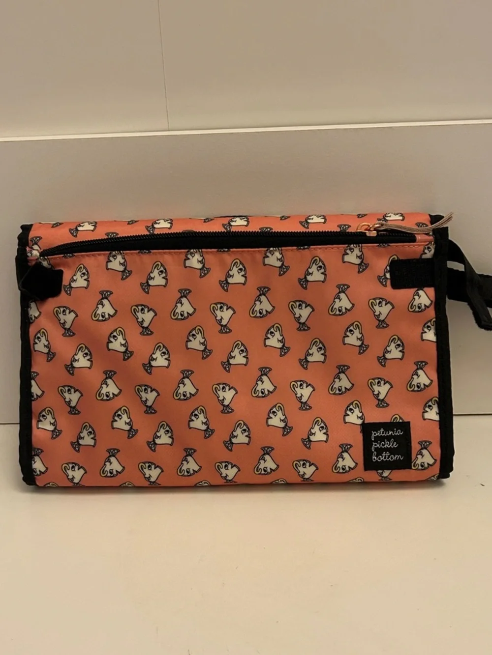 Petunia Pickle Bottom Coral Pouch with White Dog Print and Black Trim